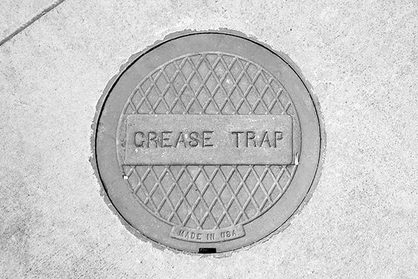 regular grease trap pumping helps prevent grease and oil from entering the water supply